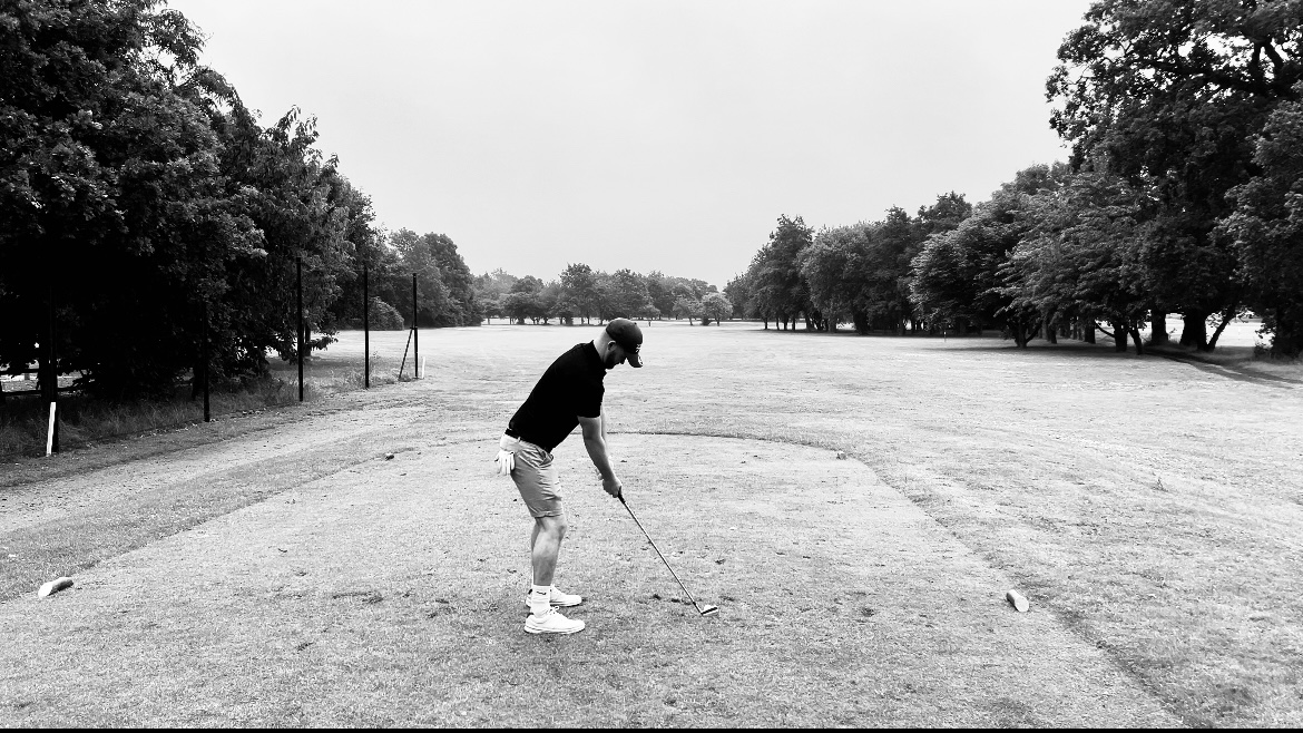 Josh playing golf